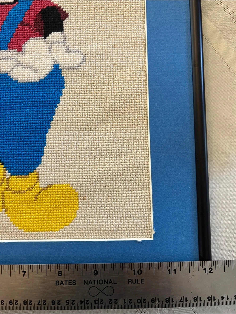 Framed and matted Handmade Cross-Stitch Mickey Mouse Artwork -